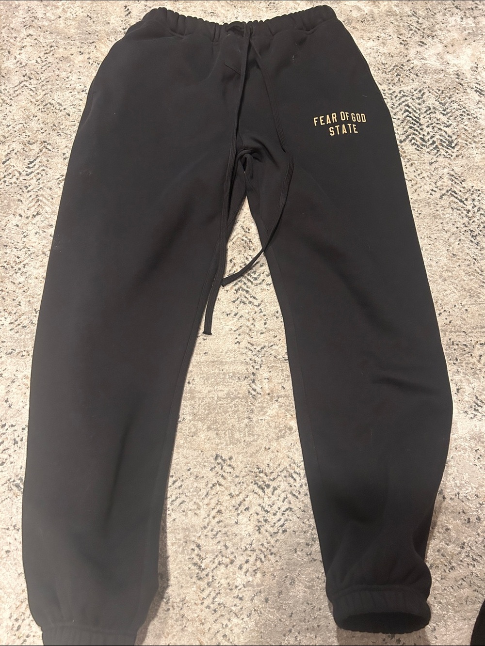Fear of God Black Sweatpants with Gold Logo